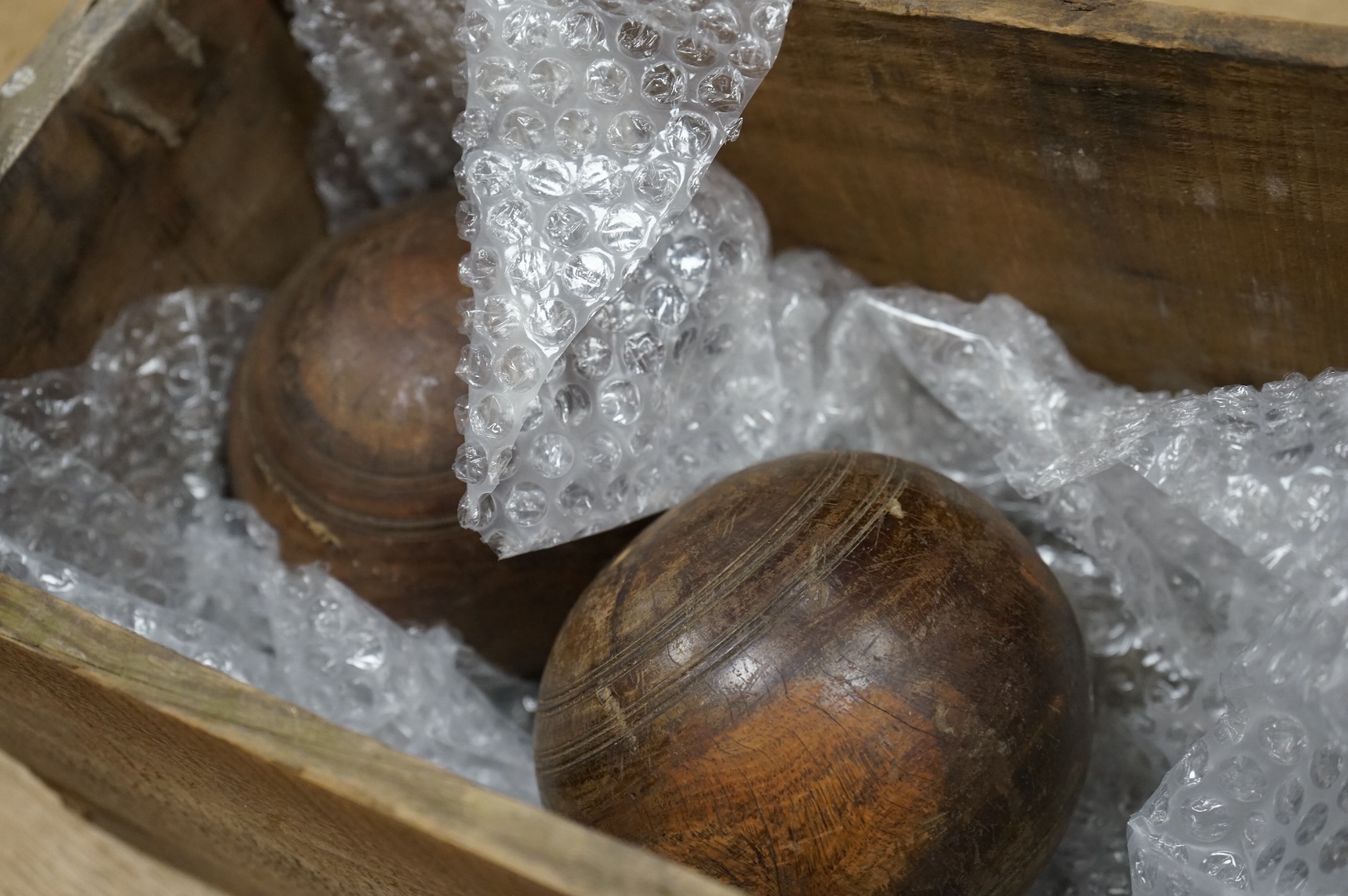 A set of four lignum vitae bowls
